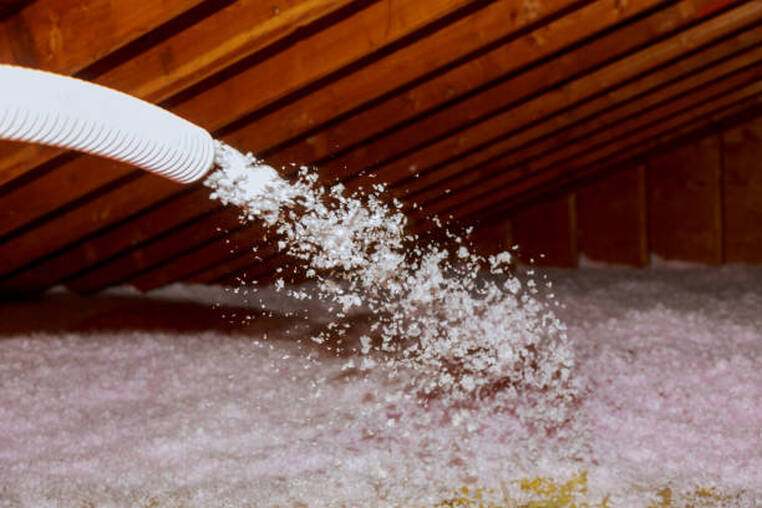 Spray foam installation in an attic floor in Norwalk.